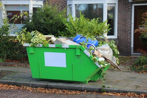 Removing unwanted plants in Teddington garden